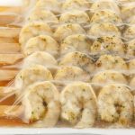 Креветка Ваннамей на шпажках очищенная в чесночном маринаде полуфабрикат замороженный Fish and More 500 г, коробка, купить оптом и в розницу с доставкой по москве и московской области, недорого, низкая цена